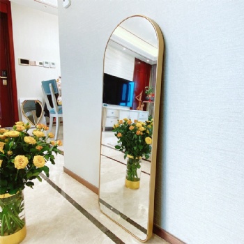 Arched full-length mirror with gold edge