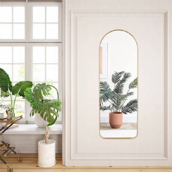 Arched full-length mirror with gold edge