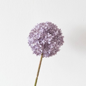 Artificial flowers with green onion balls