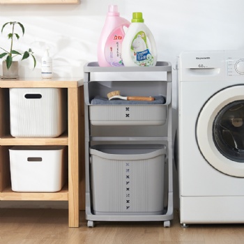 Multi-storey kitchen, bathroom with dirty laundry basket