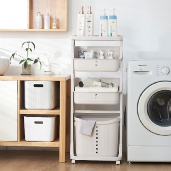 Multi-storey kitchen, bathroom with dirty laundry basket