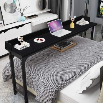 Lazy table across bed in bedroom