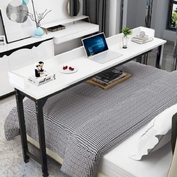 Lazy table across bed in bedroom